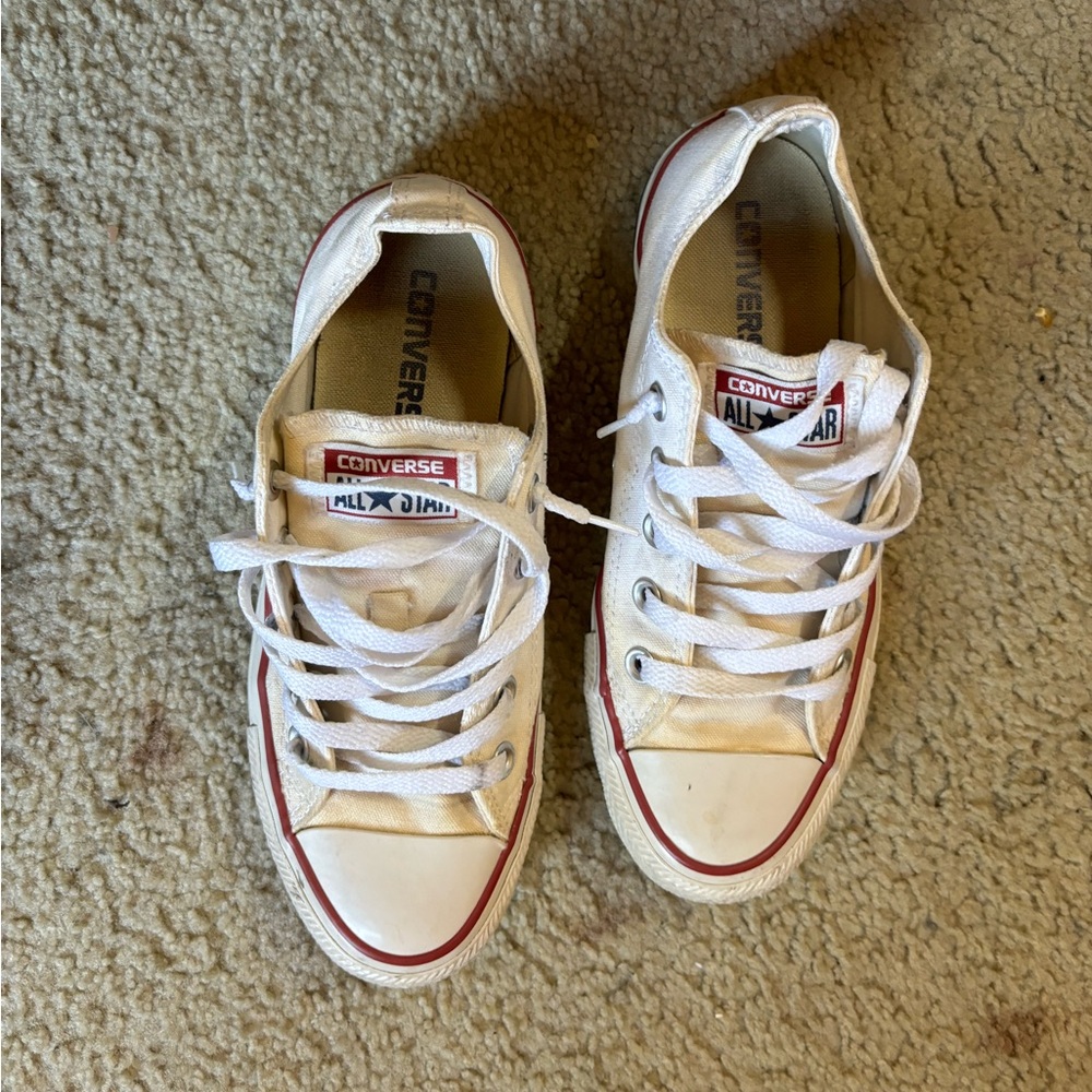 Converse low tops. worn. need washed.